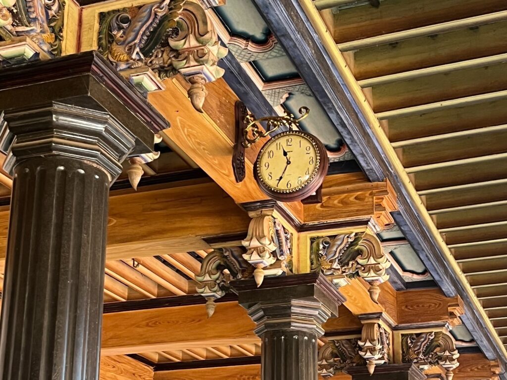 Time suspended: intricately carved Burmese teak beams, black Italian marble pillars, and a colonial-era Swiss clock — elements that showcase both the technical mastery and global reach of Chettinad’s builders. Photo courtesy: Rayhaan Imam